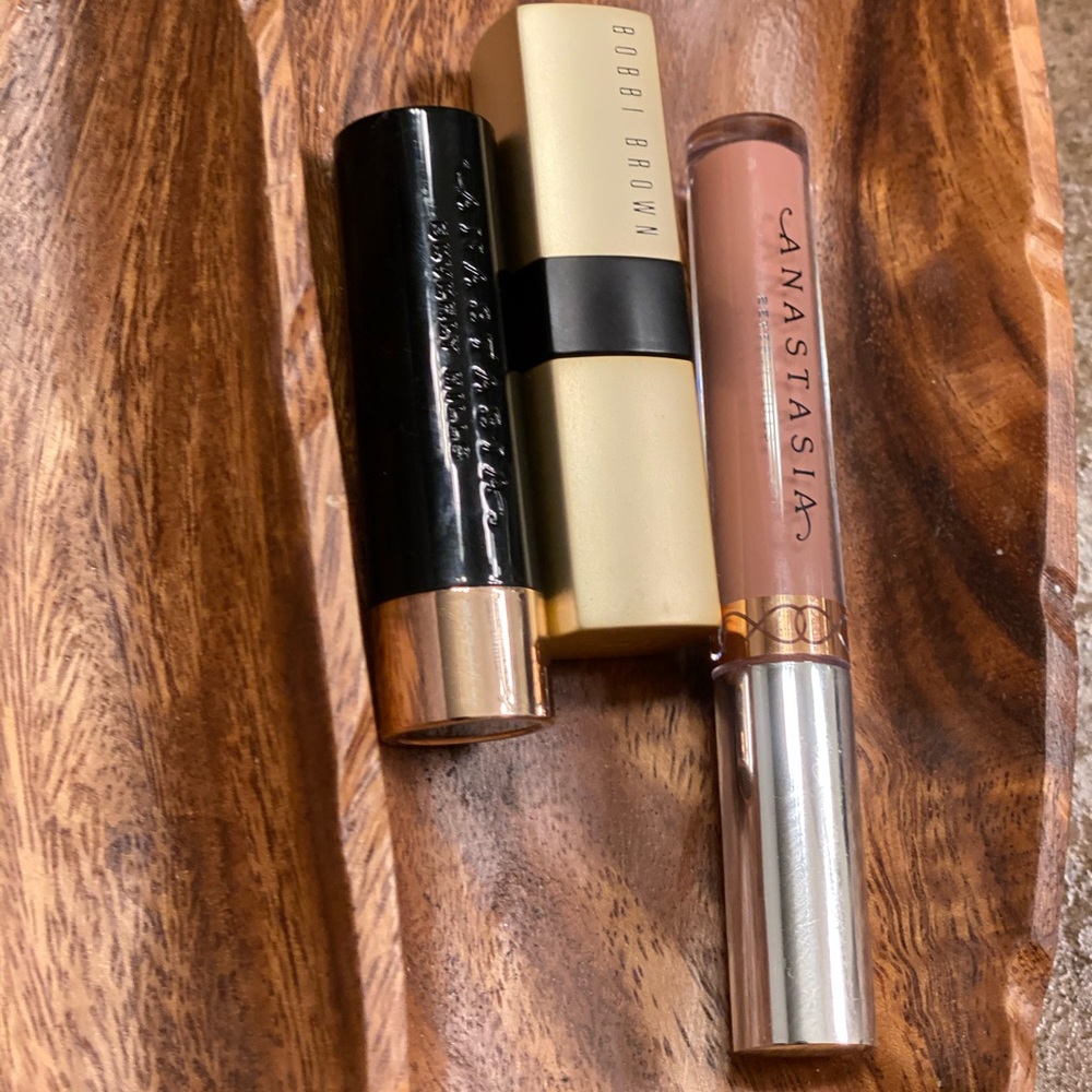 Lot of three luxury brand lipsticks.  -